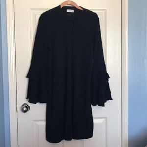 Black mini dress with bell sleeves